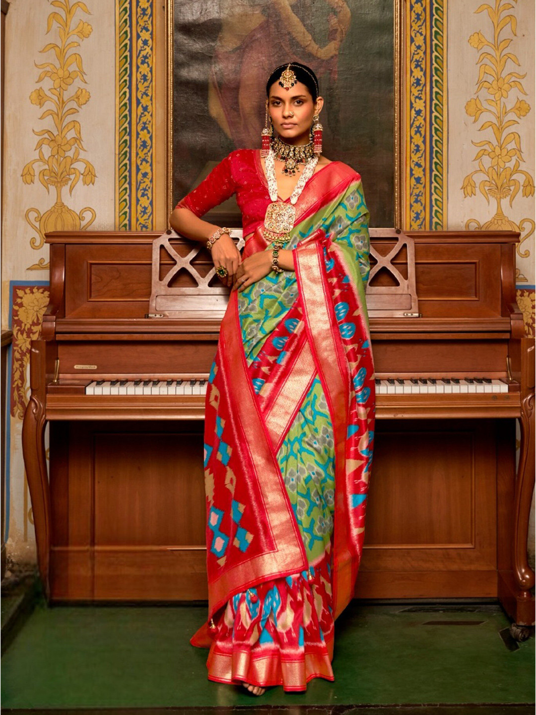 

Mitera Ethnic Motifs Printed Zari Patola Saree, Green
