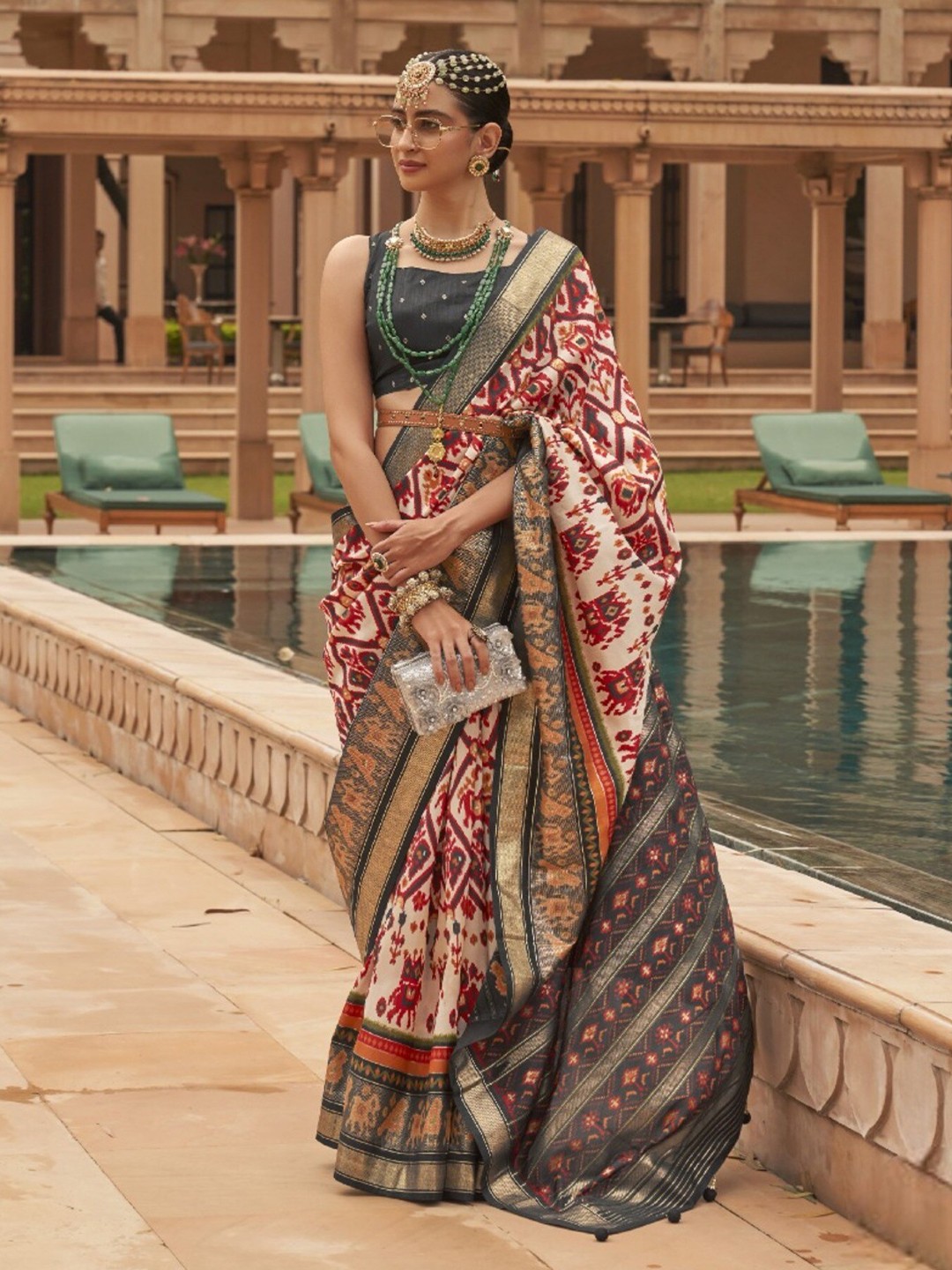 

Mitera Ethnic Motifs Printed Patola Saree, White