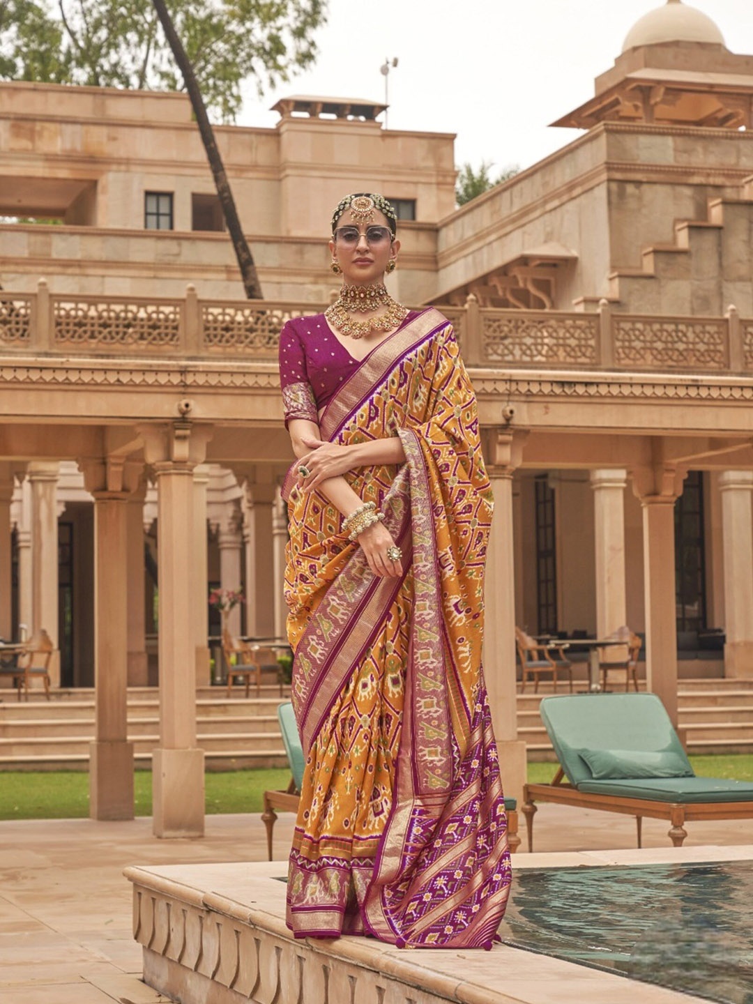

Mitera Mustard & Purple Ethnic Motifs Printed Zari Patola Saree, Yellow