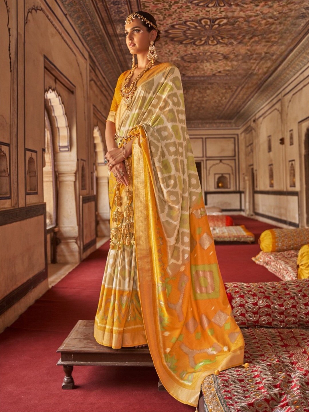 

Mitera Ethnic Motifs Printed Zari Patola Saree, Yellow