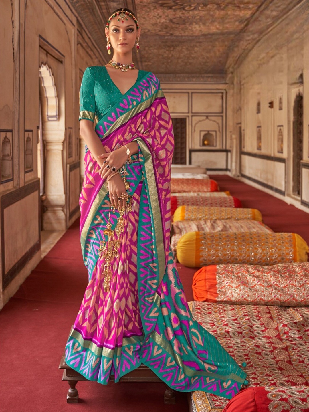 

Mitera Pink & Sea Green Ethnic Motif Printed Zari Patola Saree