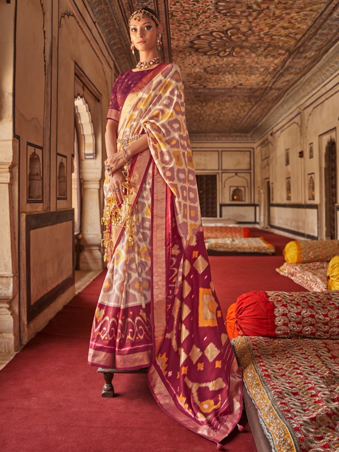 

Mitera Off white & Maroon Ethnic Motif Printed Zari Patola Saree