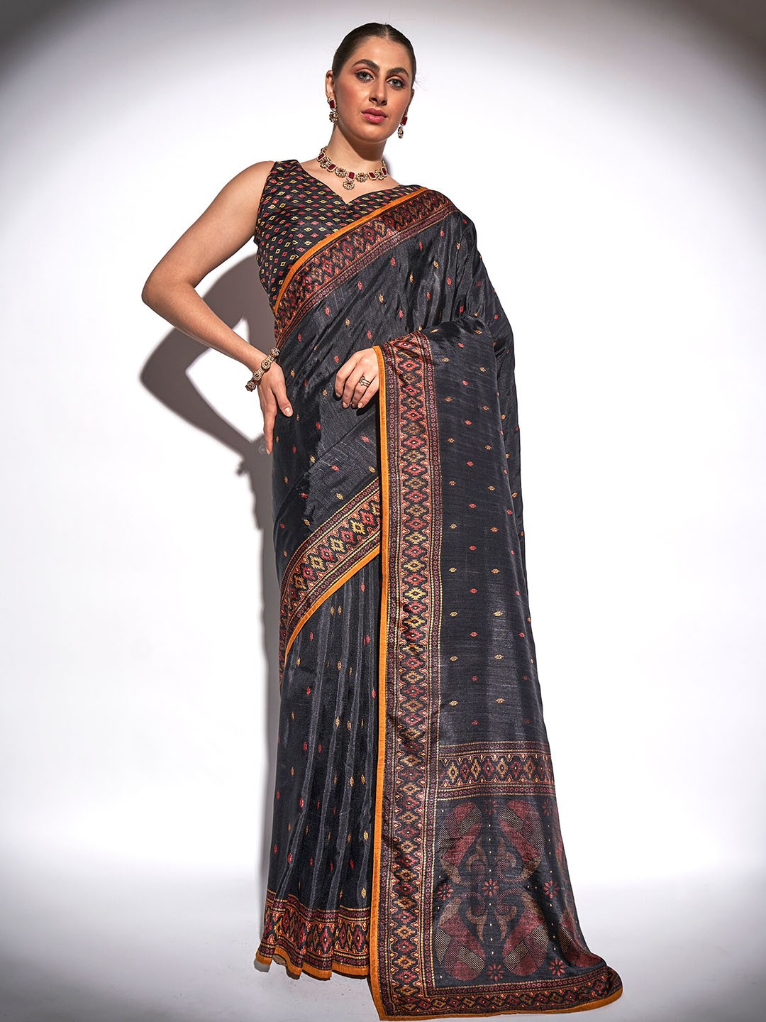

Kalista Black & Red Ethnic Motifs Printed Saree