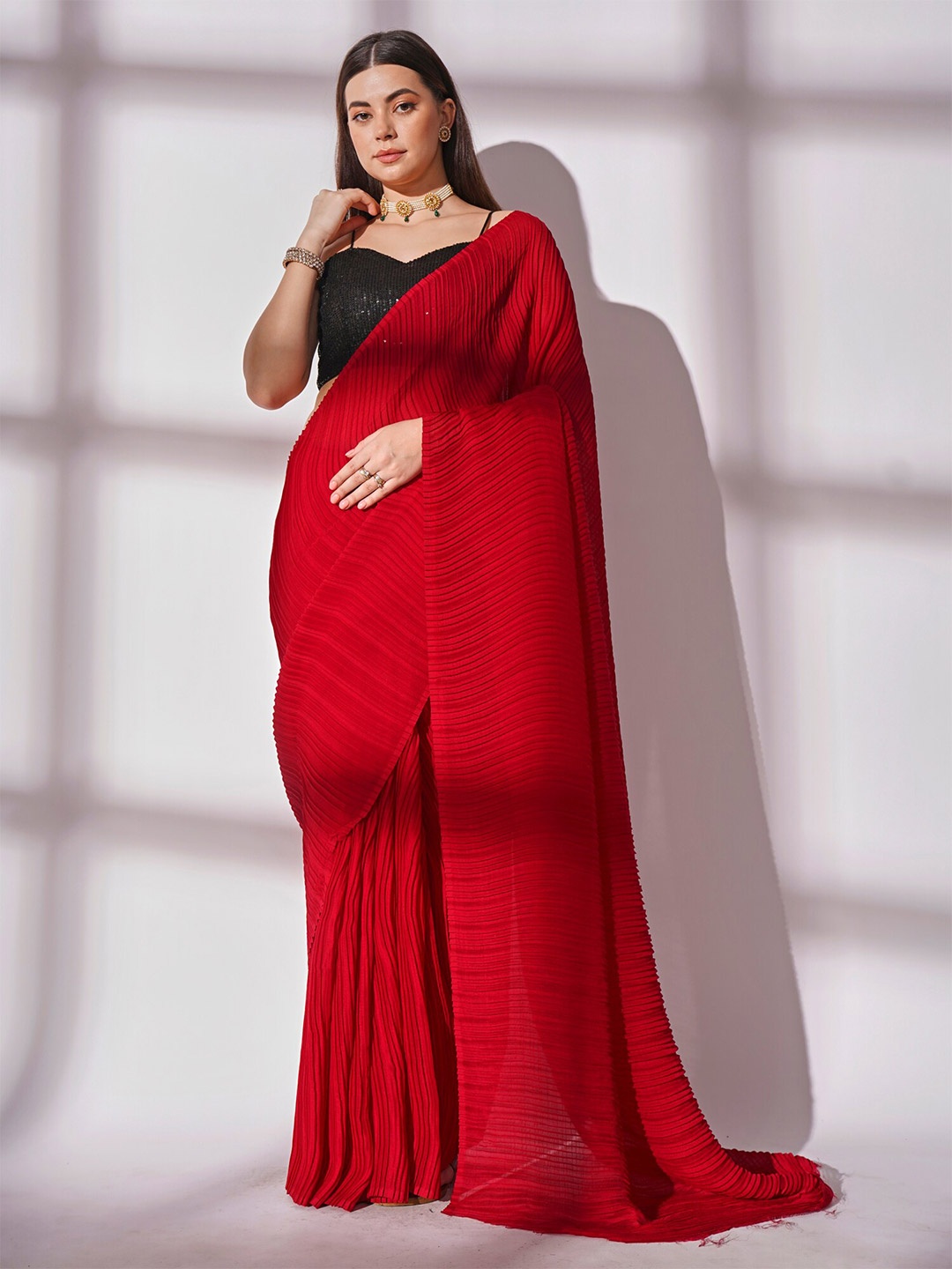 

Kalista Red Pleated Pure Georgette Saree