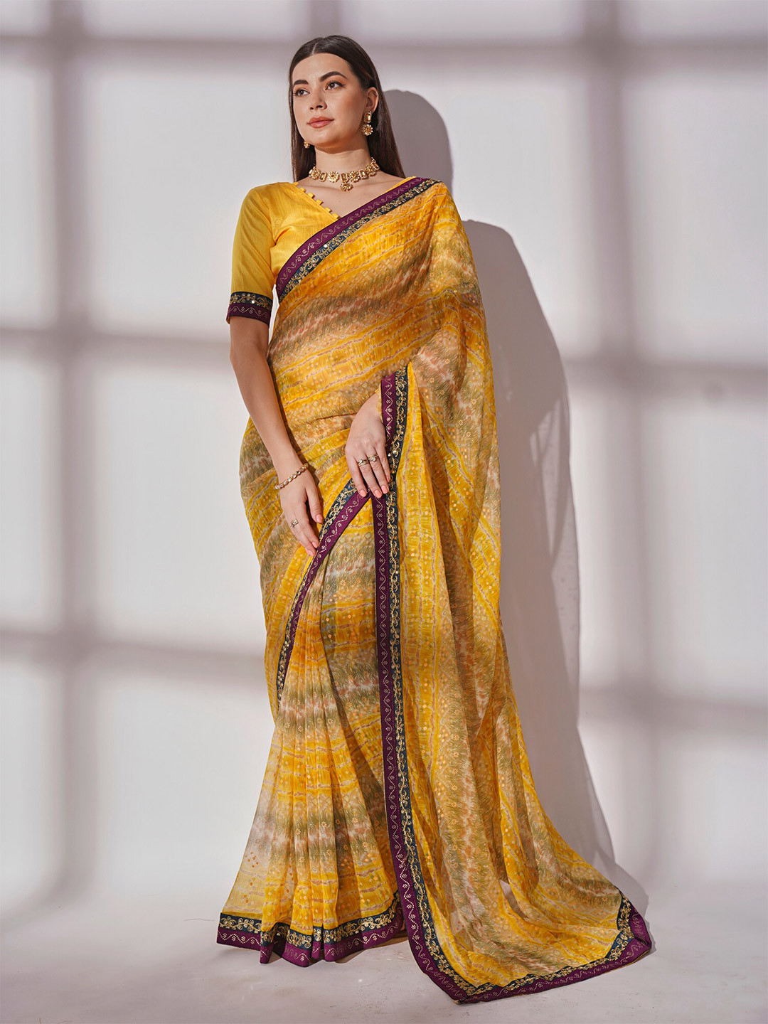 

Kalista Yellow & Green Abstract Printed Pure Georgette Saree