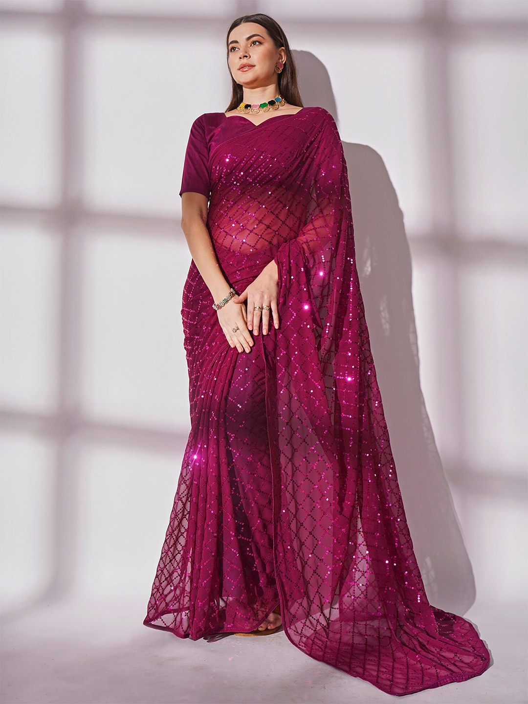 

Kalista Magenta Embellished Sequinned Georgette Saree