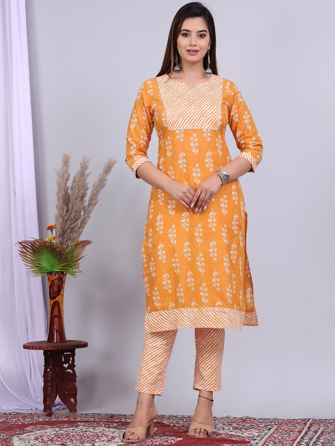 

SkyaSia Floral Printed Gotta Patti Pure Cotton Kurta with Trousers, Mustard