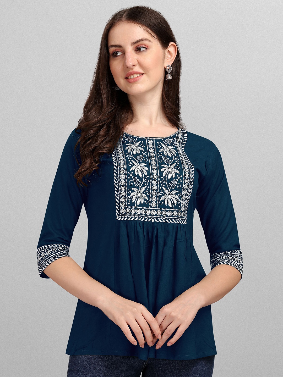 

Shree Ramkrishna Fab Ethnic Motif Embroidered A-Line Top, Blue