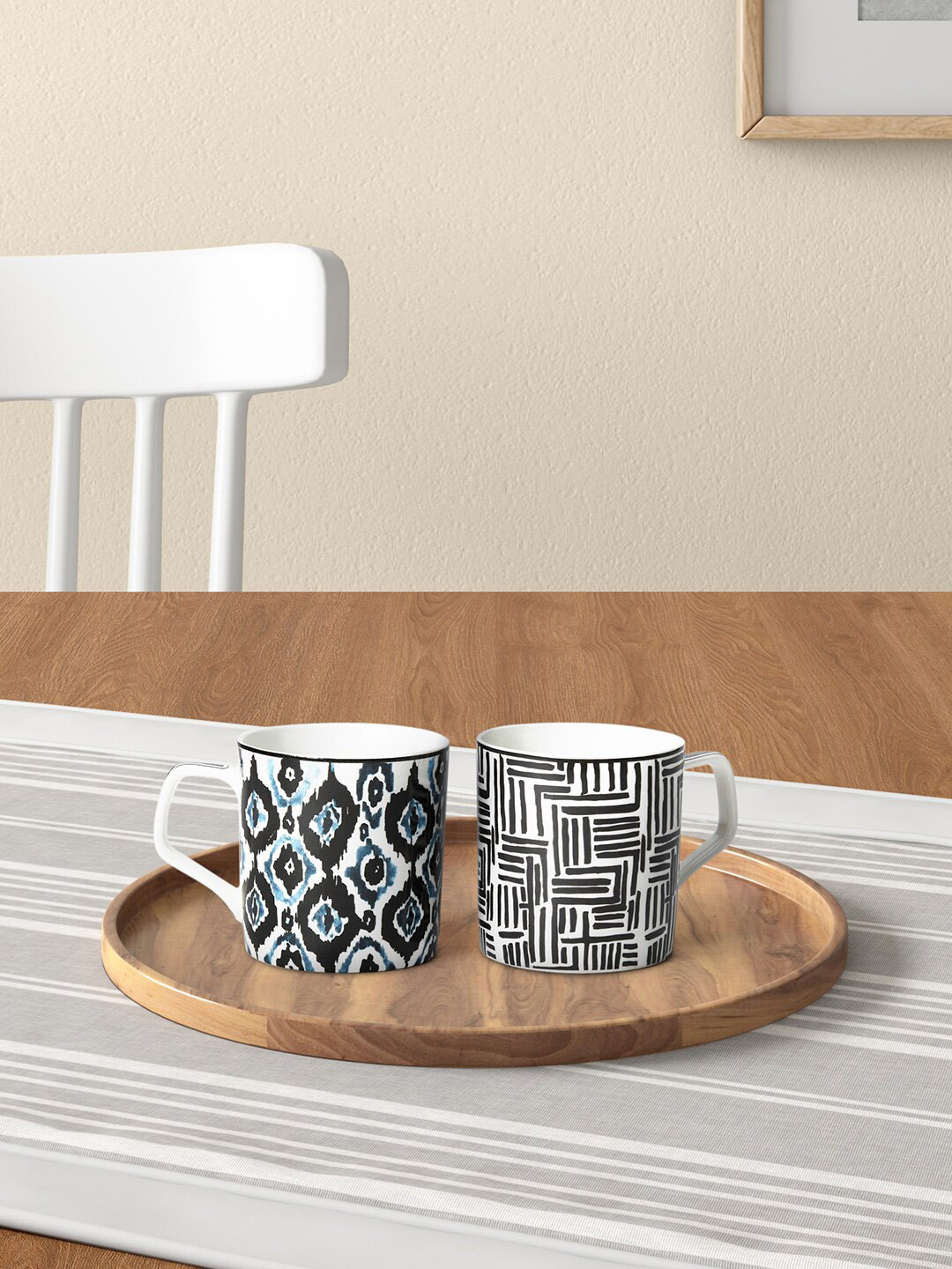

Living scapes by Pantaloons White & Black 2 Pieces Printed Bone China Glossy Mugs
