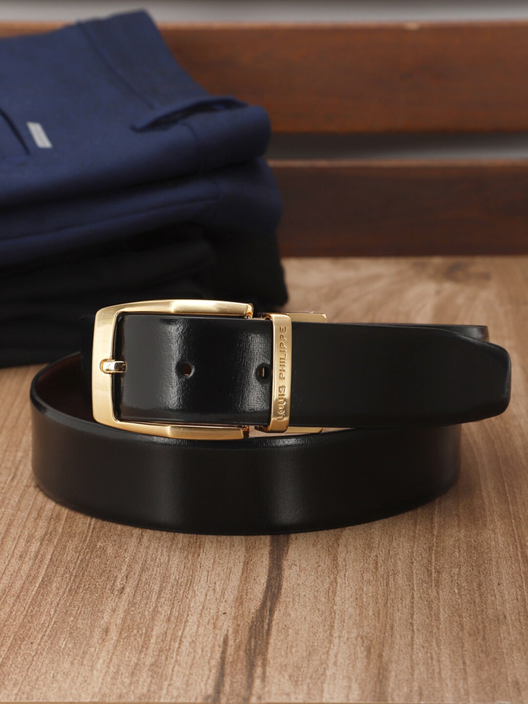 

Louis Philippe Men Solid Formal Leather Belt With Tang Closure, Black
