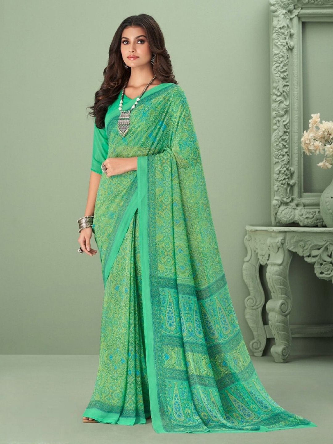

Mitera Green & Mustard Yellow Ethnic Motifs Printed Poly Georgette Saree