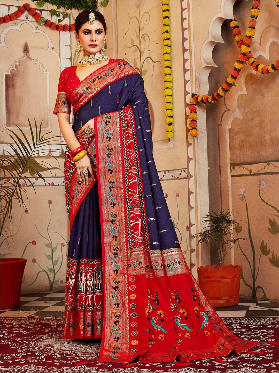 

Anouk Navy Ethnic Motifs Printed Zari Patola Saree, Navy blue