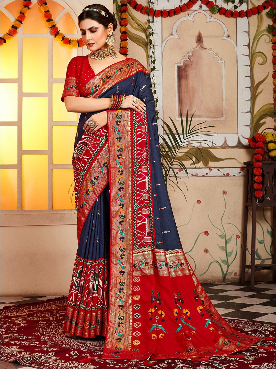 

Anouk Navy Blue & Red Ethnic Motifs Zari Silk Blend Patola Saree