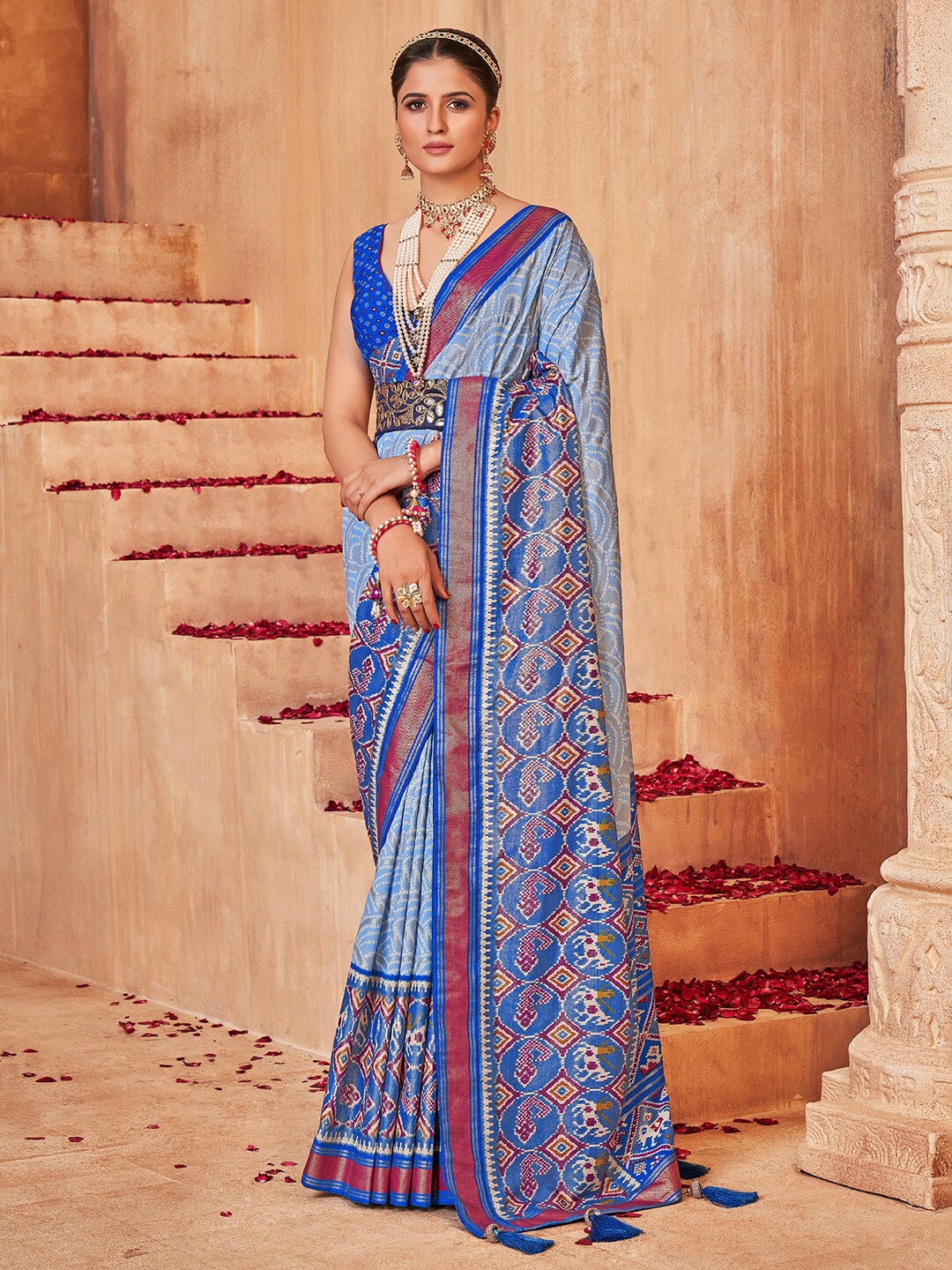 

Anouk Blue & Red Ethnic Motif Woven Design Zari Saree