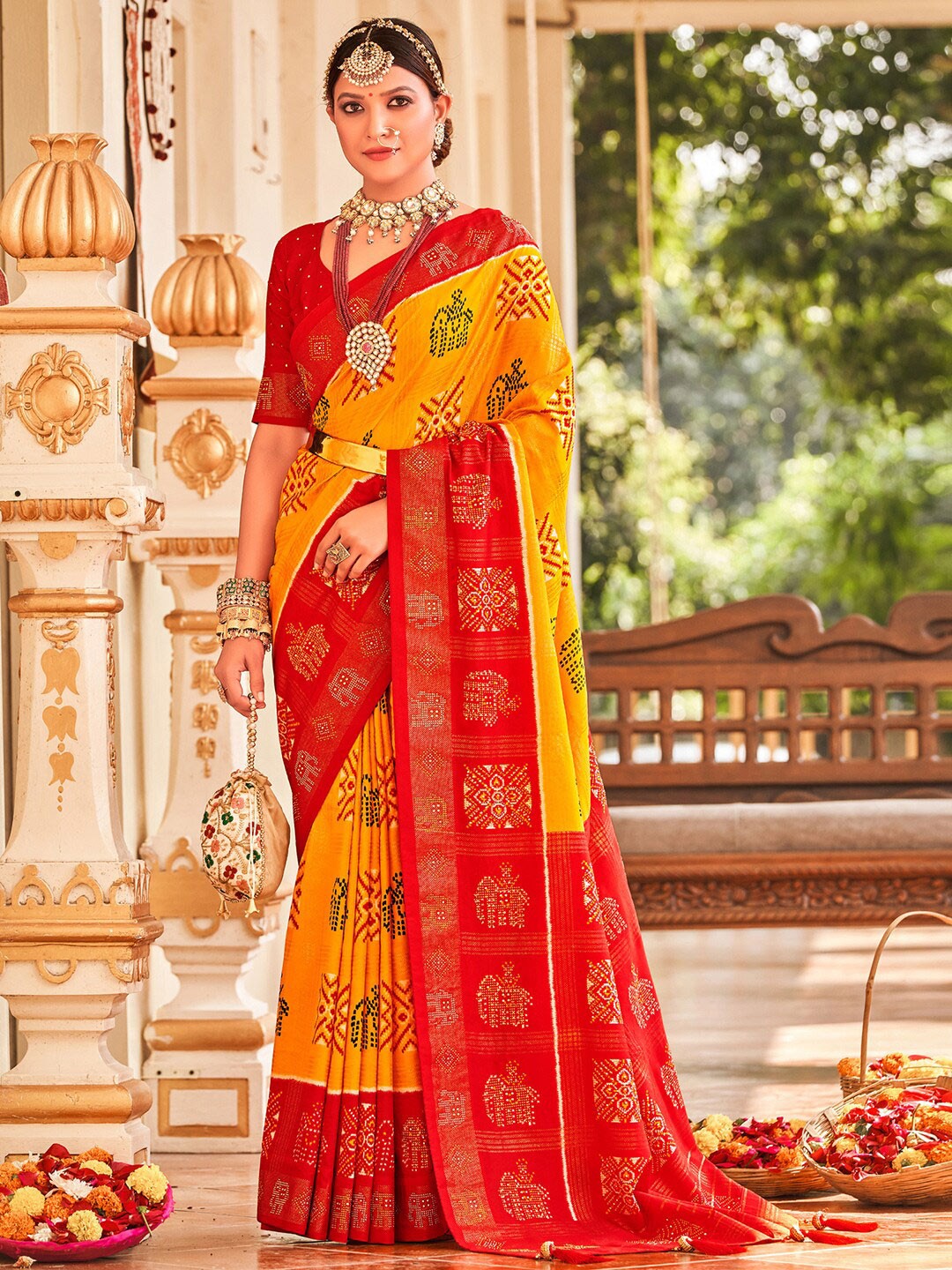 

Anouk Ethnic Motifs Printed Patola Saree, Yellow