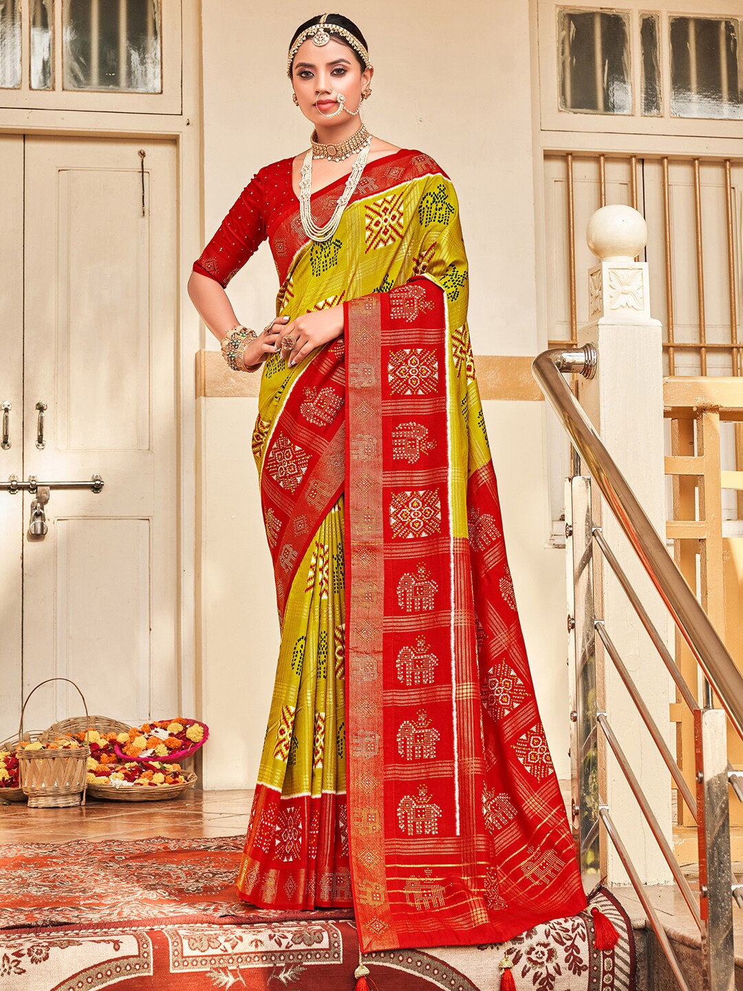 

Anouk Olive Green & Red Ethnic Motifs Beads and Stones Silk Blend Patola Saree