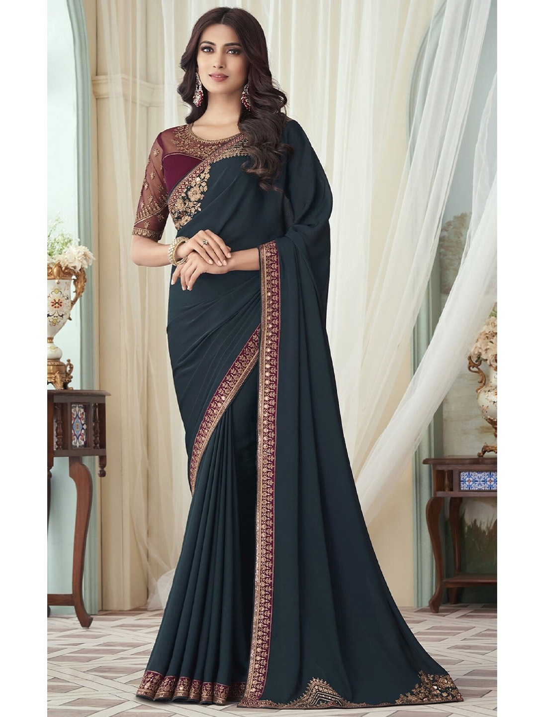 

Mitera Teal & Gold-Toned Embroidered Sequinned Border Silk Blend Saree