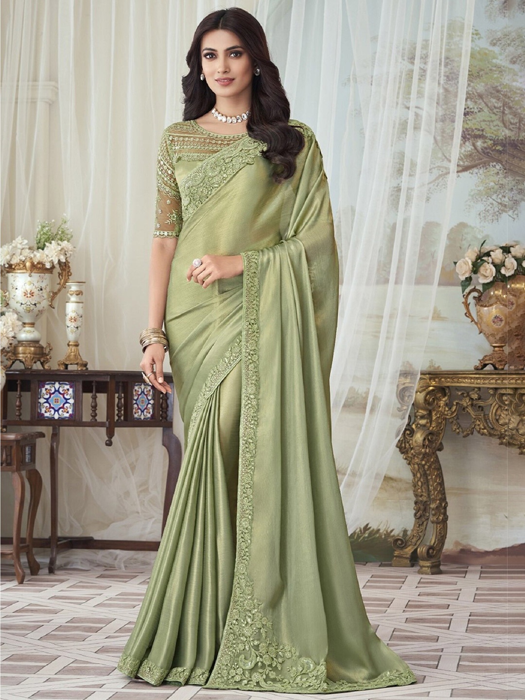 

Mitera Green Embroidered Sequinned Silk Blend Saree