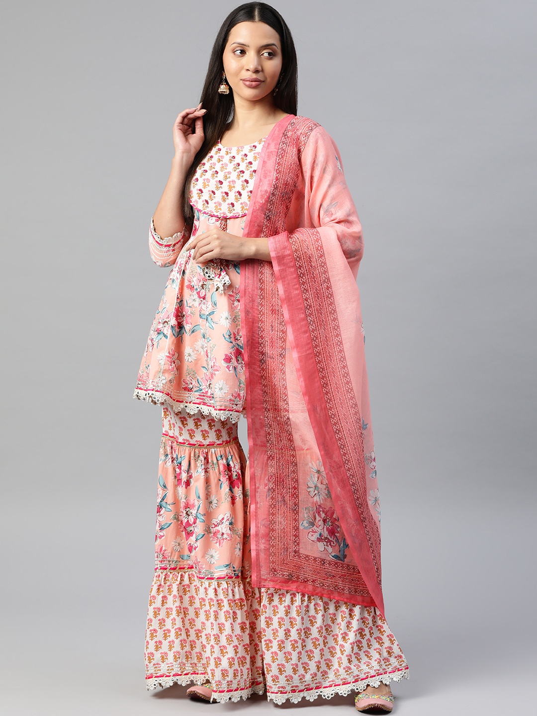 

Readiprint Fashions Women Floral Kurti with Sharara & Dupatta, Peach