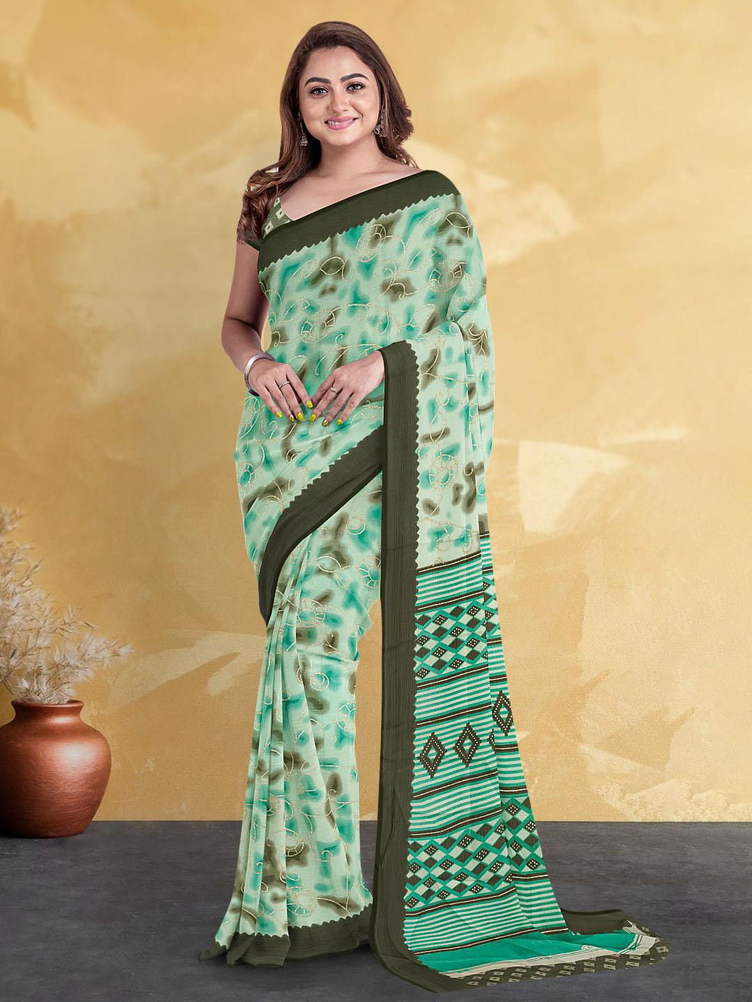 

Kalamandir Abstract Printed Saree, Sea green