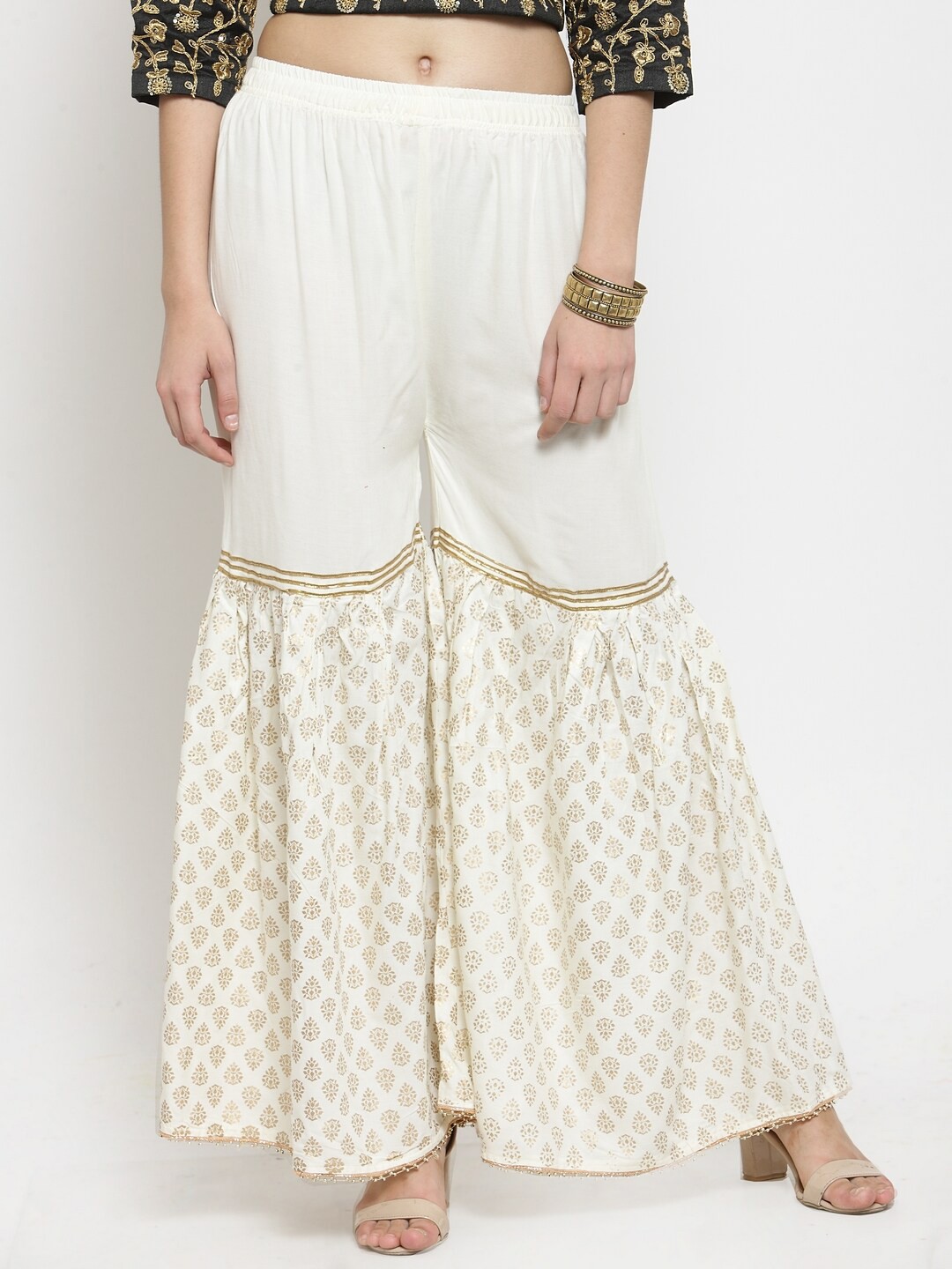 

Clora Creation Women Ethnic Motifs Printed Flared Palazzos, Off white