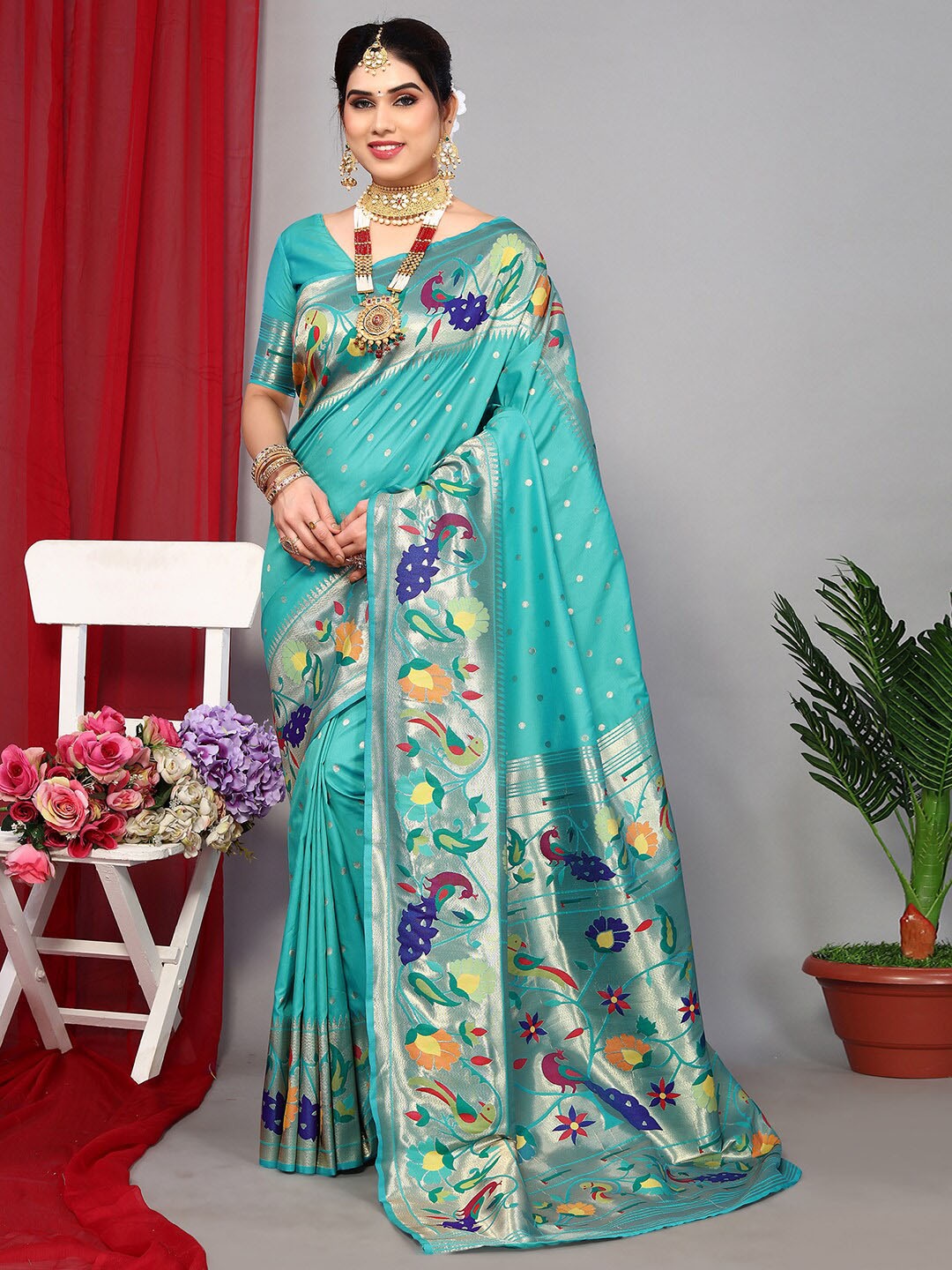 

Satrani Turquoise Blue & Purple Ethnic Motifs Woven Design Zari Paithani Saree