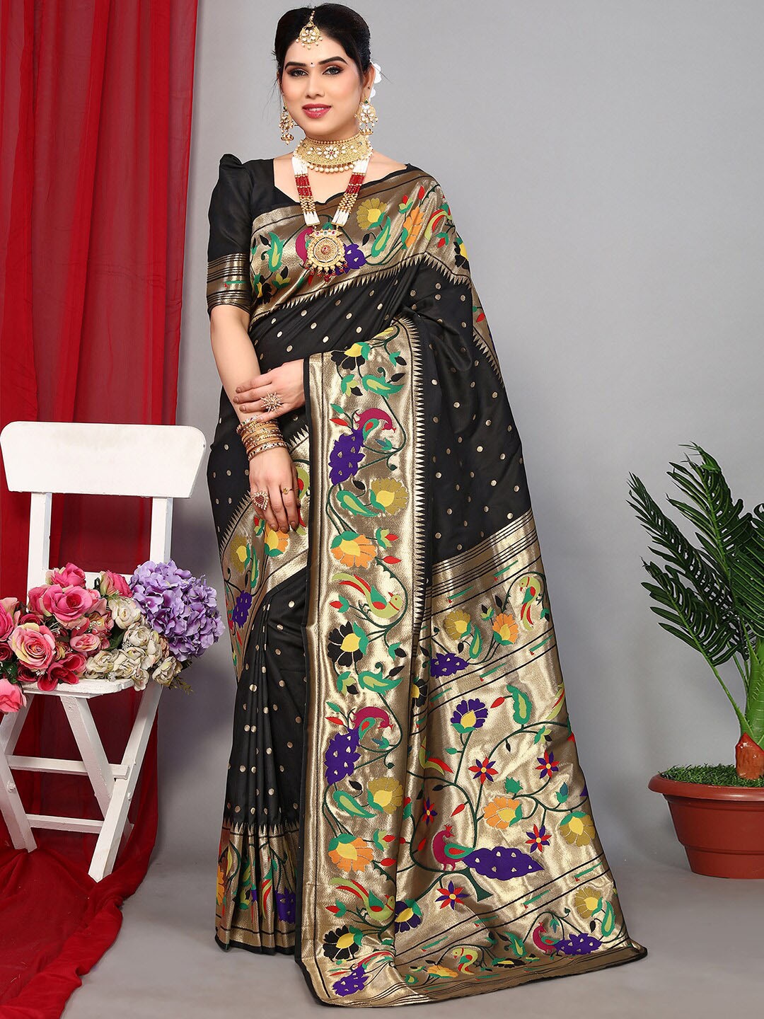 

Satrani Black & Purple Ethnic Motifs Woven Design Zari Paithani Saree