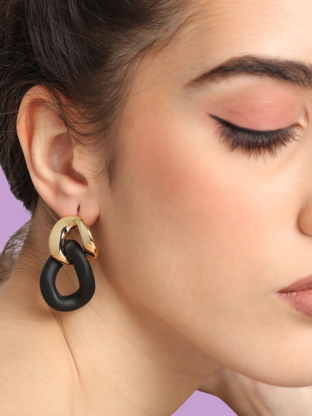

SOHI Gold-Plated Contemporary Drop Earrings