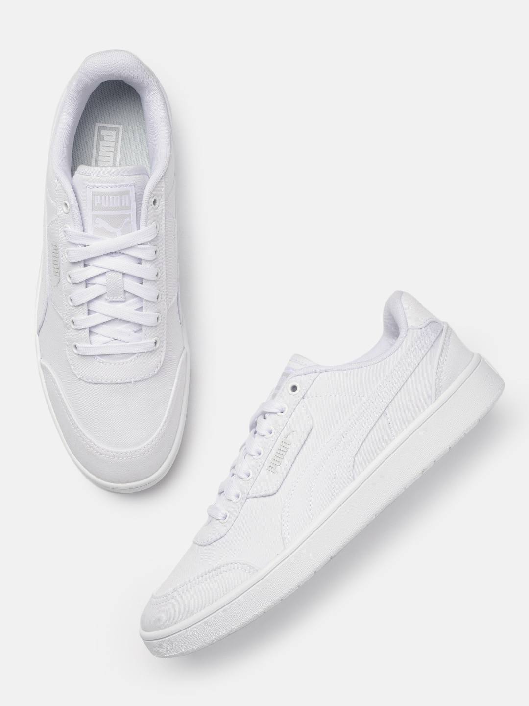 

Puma Unisex Solid Court Guard CVS Canvas Sneakers, White