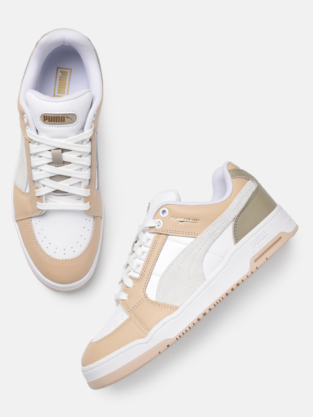 

Puma Unisex Perforations & Colourblocked Slipstream Lo Lux Leather Regular Sneakers, White