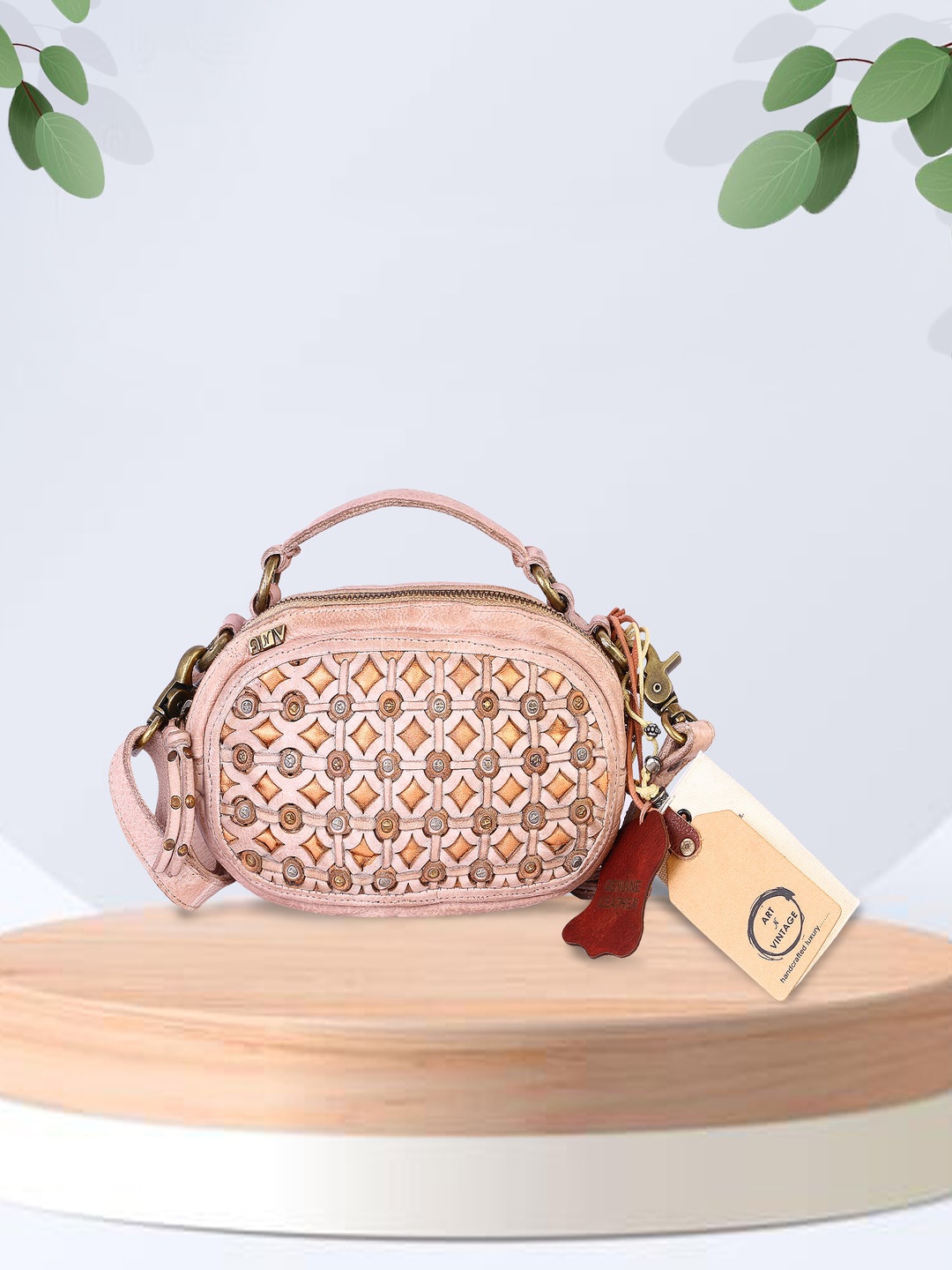 

ART N VINTAGE Textured Leather Structured Sling Bag with Tasselled, Pink