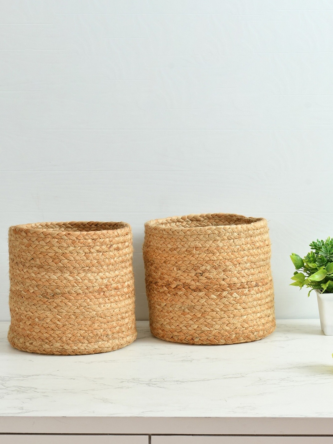 

Homefab India Beige 2 Pieces Braided Woven Jute Planter Baskets