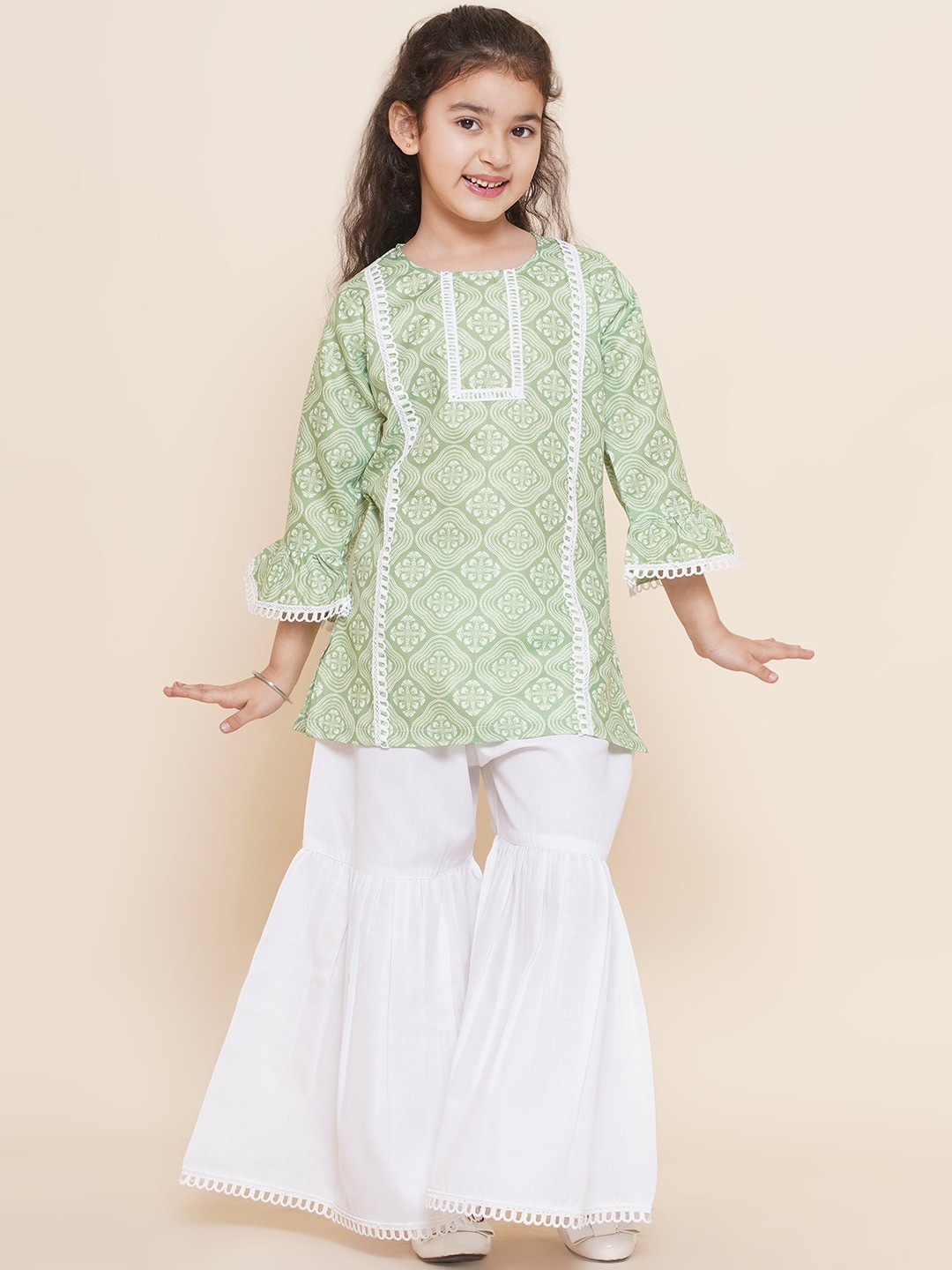 

Aj DEZInES Girls Ethnic Motifs Printed Bell Sleeves Pure Cotton Kurti With Sharara, Green