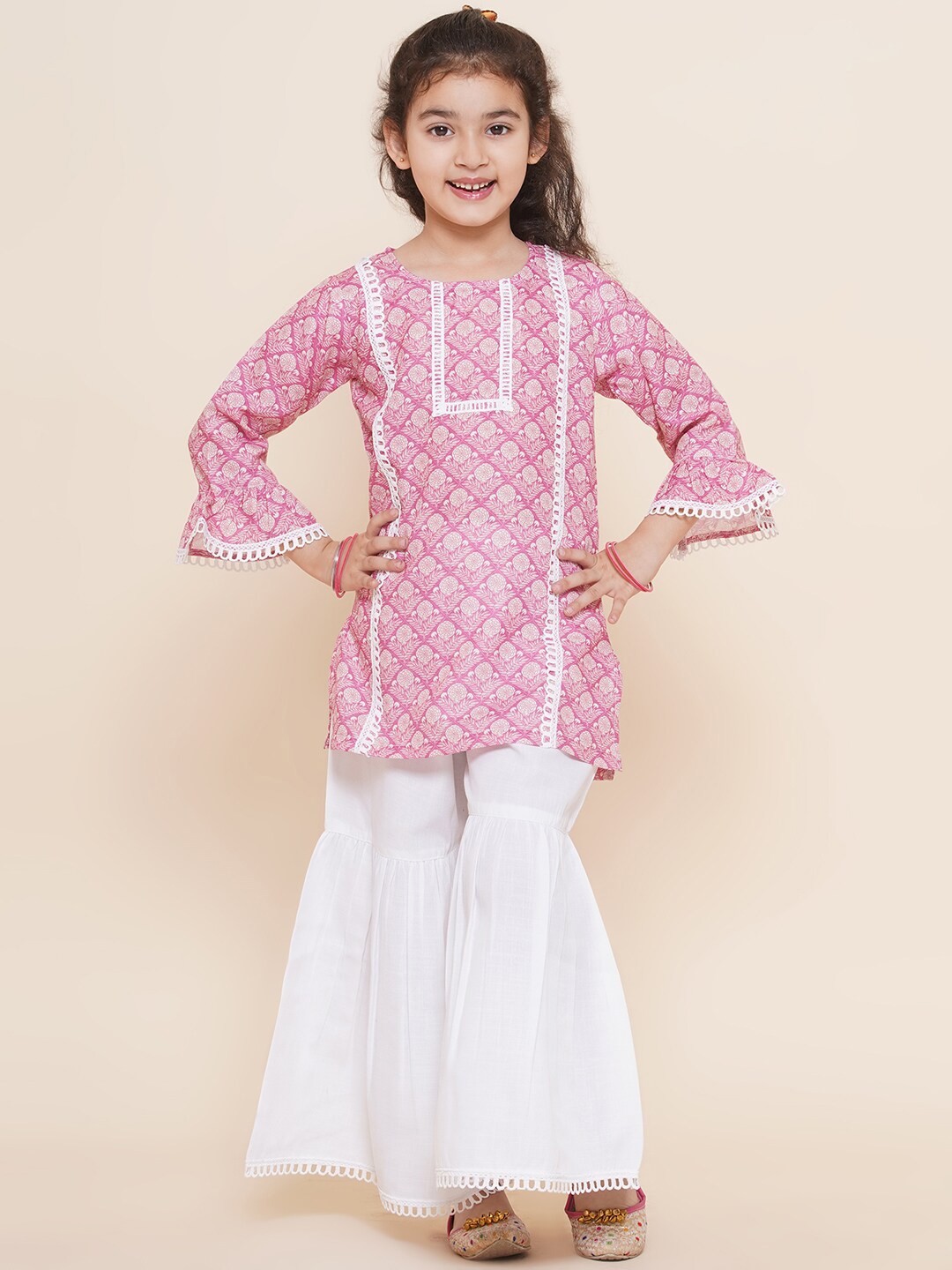 

Aj DEZInES Girls Floral Printed Bell Sleeves Pure Cotton Kurti With Sharara, Pink