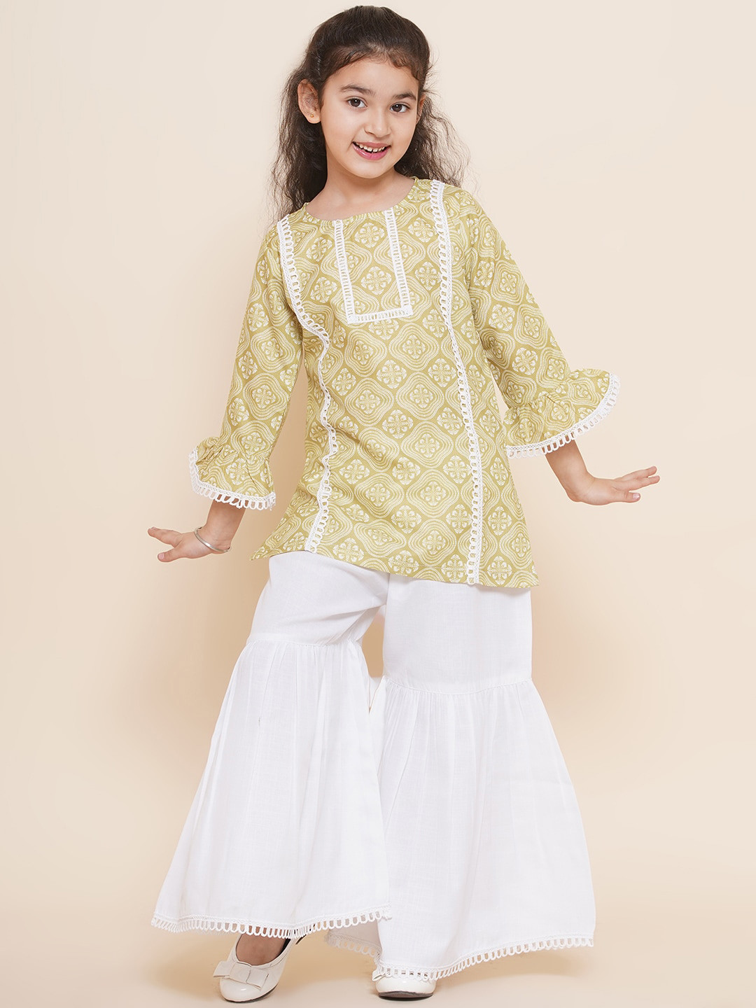 

Aj DEZInES Girls Ethnic Motif Printed Bell Sleeves Pure Cotton Kurti With Sharara, Beige