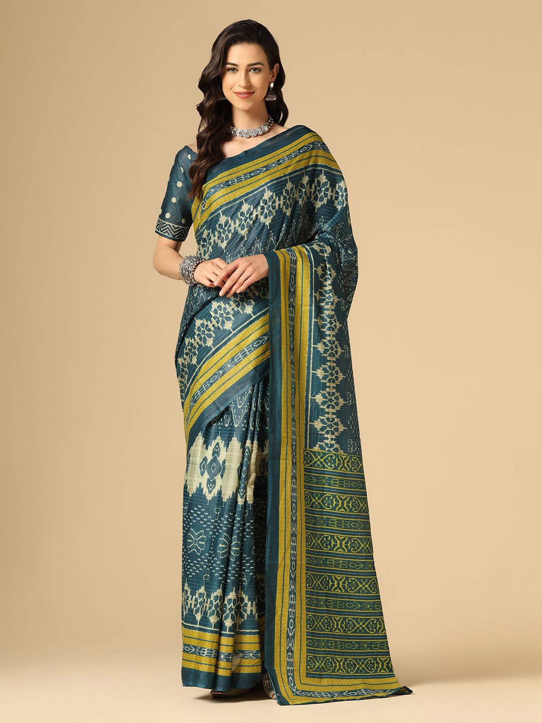

Mitera Blue & Green Ethnic Motifs Printed Cotton Blend Saree