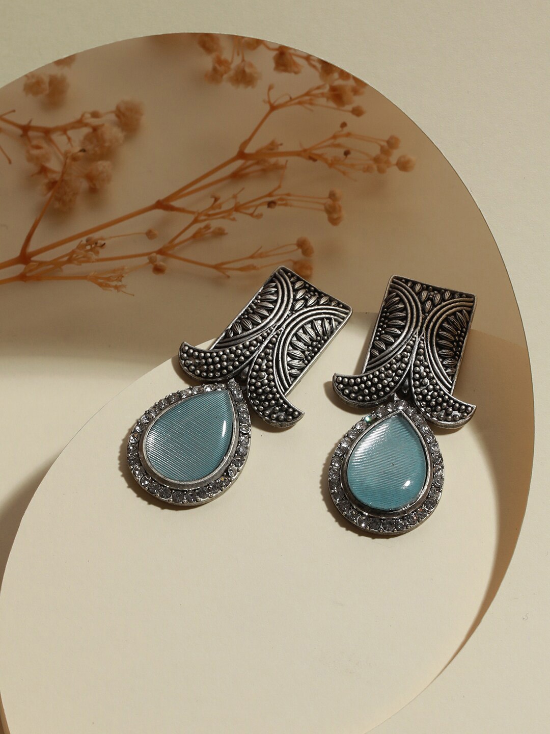 

Jazz and Sizzle Silver-Plated Teardrop Shaped Drop Earrings