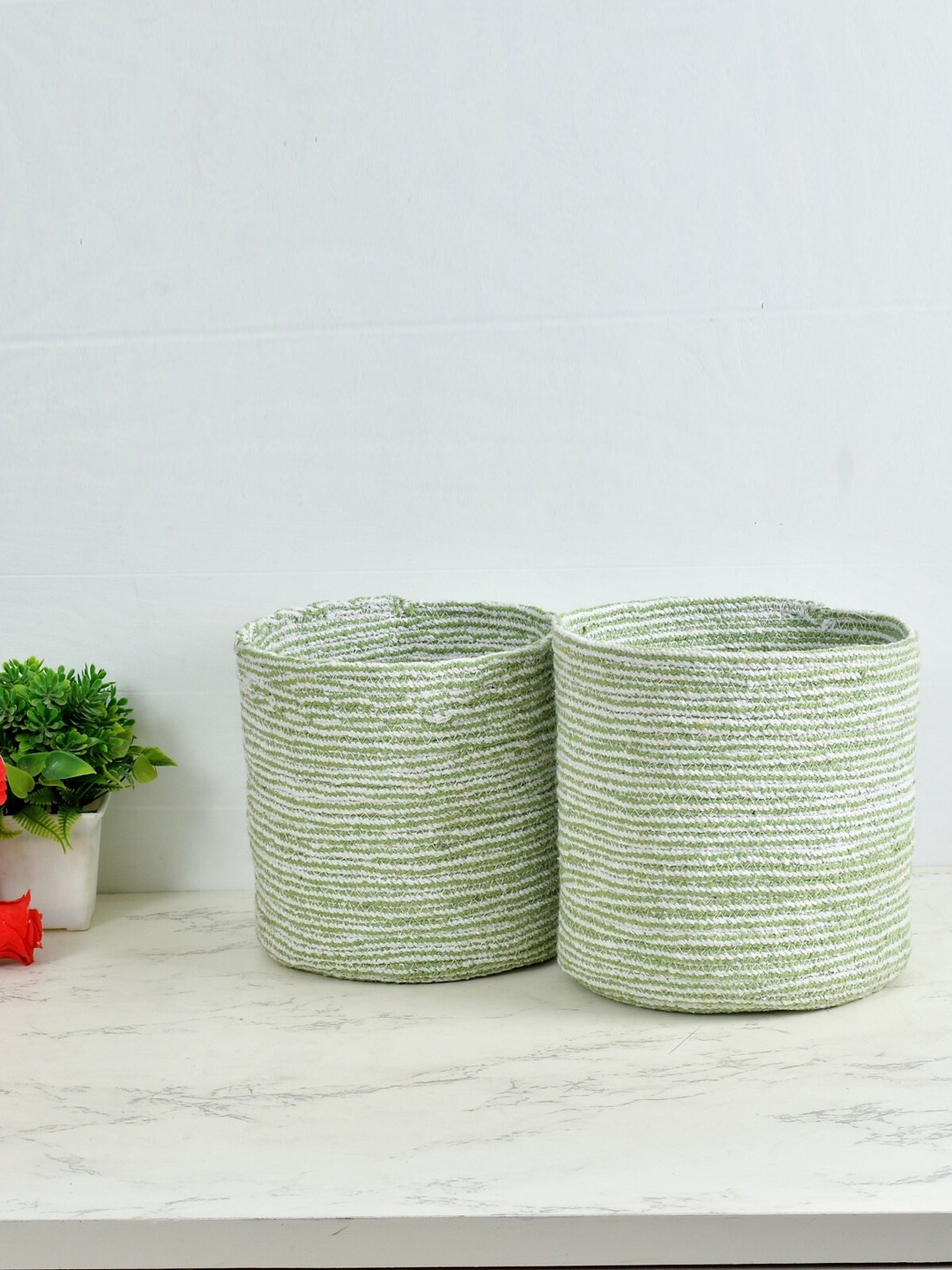 

Homefab India 2-Pieces Green & White Braided Woven Design Cotton Planter Baskets