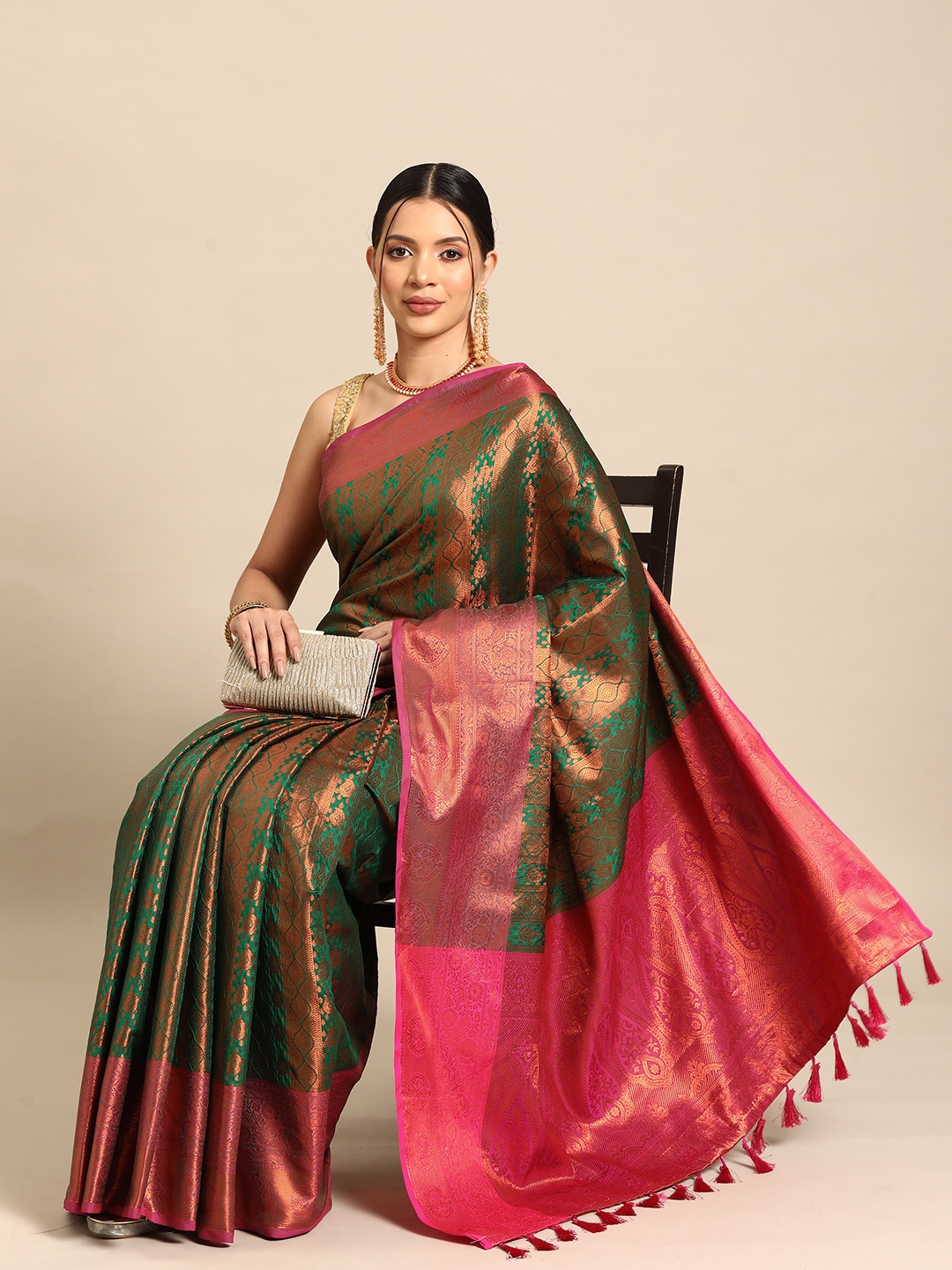 

Silk Land Green & Copper-Toned Ethnic Motifs Zari Art Silk Banarasi Saree