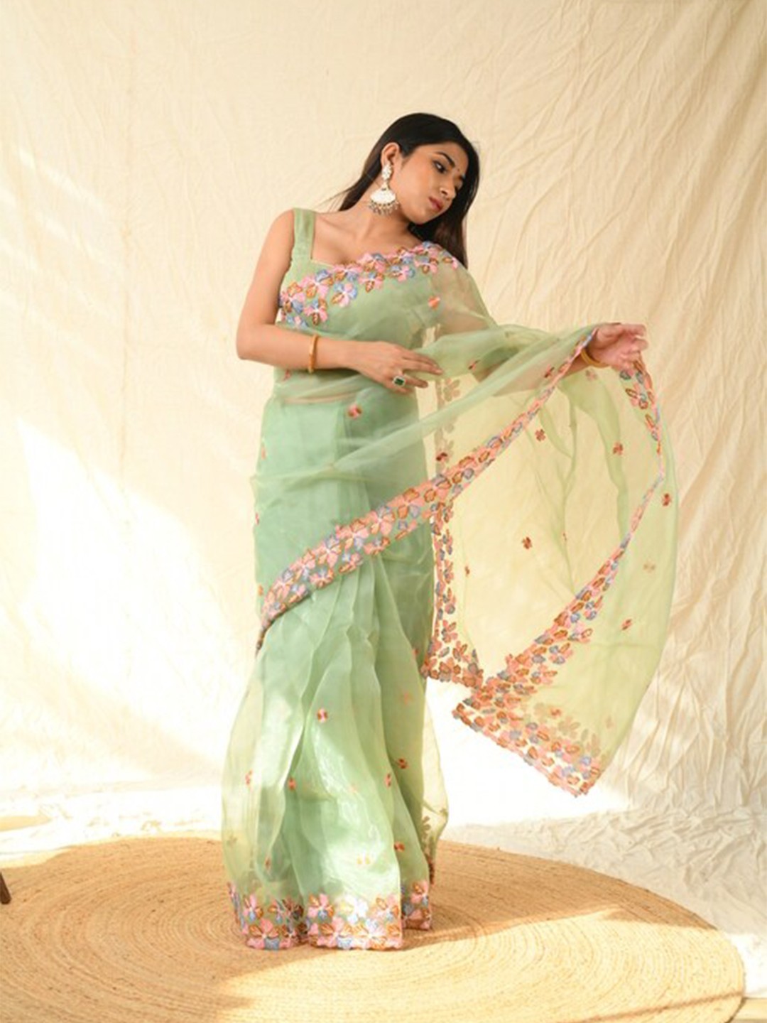 

Exclusiva Green & Pink Floral Embroidered Organza Saree