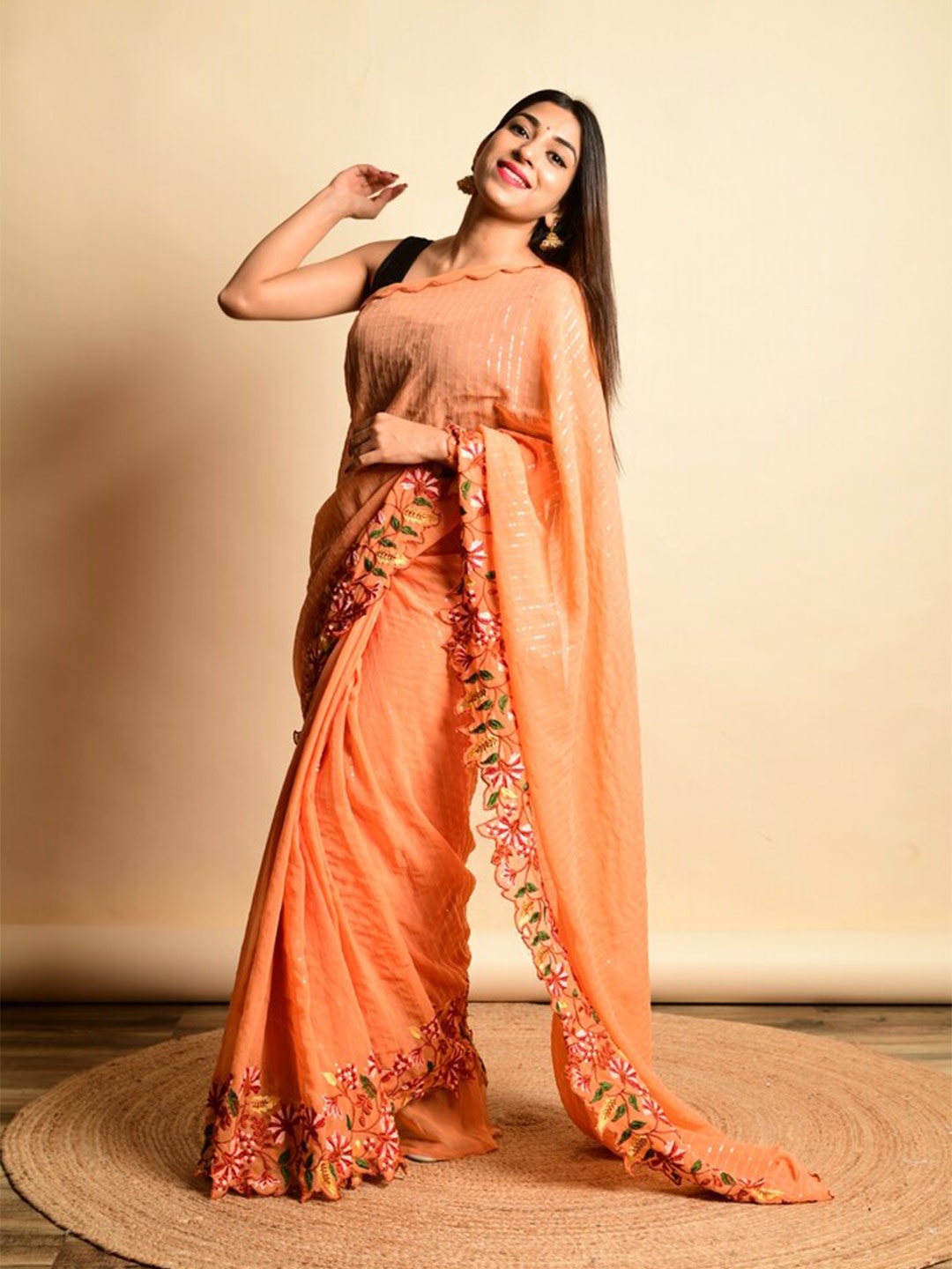 

Exclusiva Embellished Embroidered Poly Georgette Saree, Orange