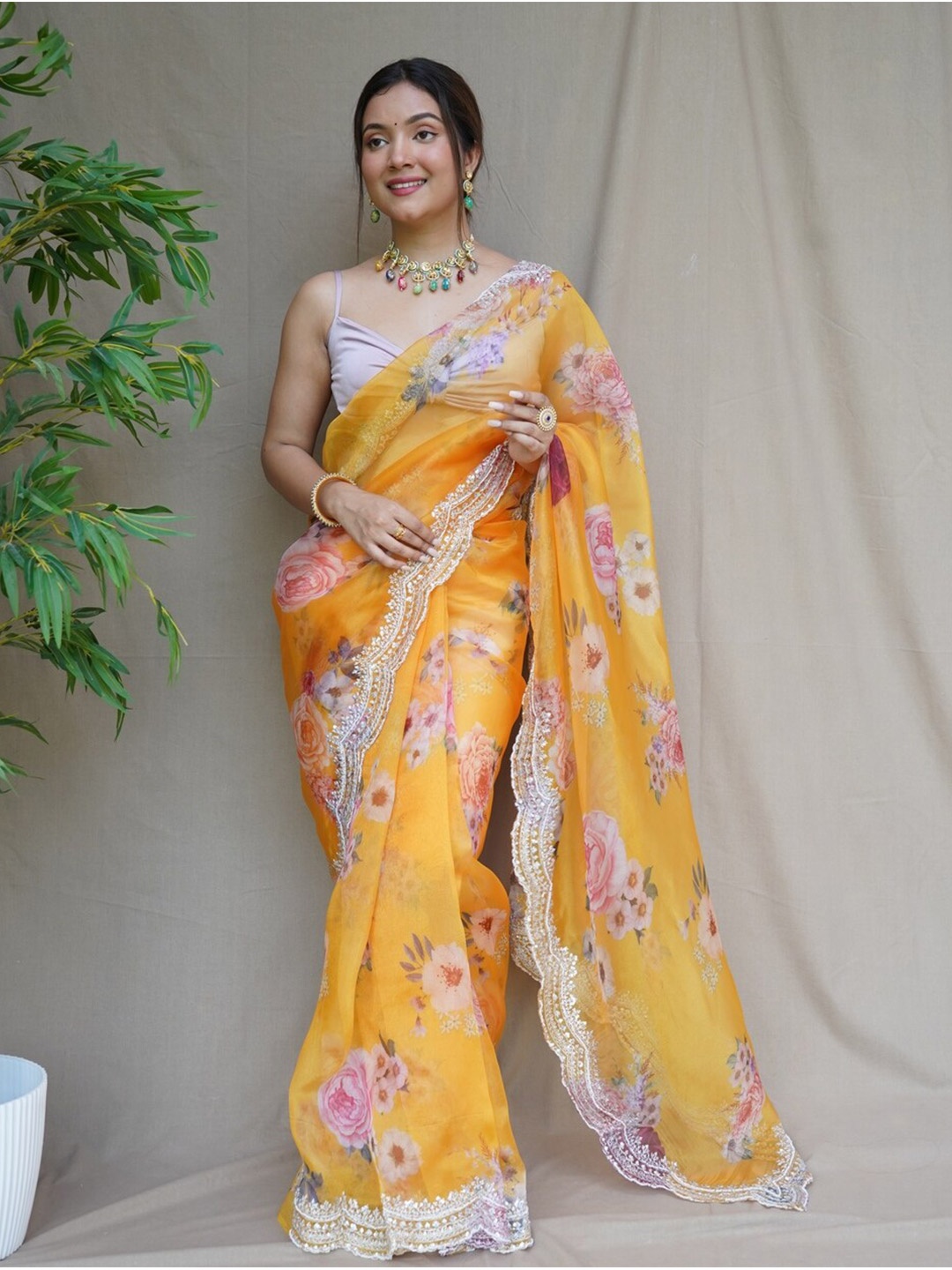 

Exclusiva Floral Printed Embroidered Organza Saree, Mustard
