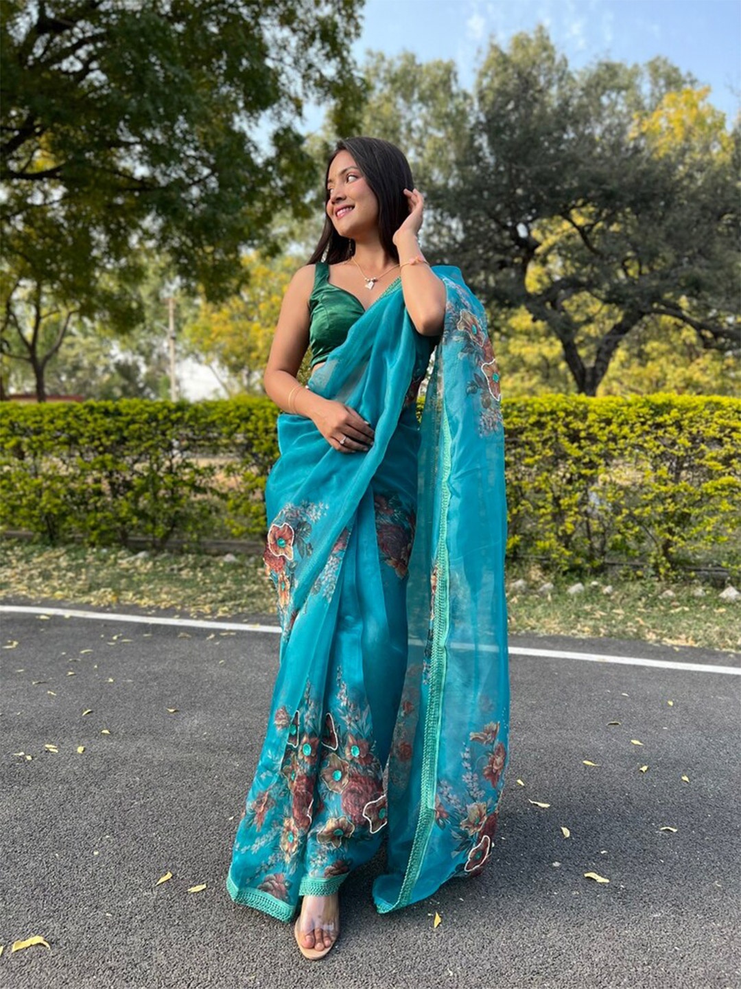 

Exclusiva Ethnic Motifs Embroidered Organza Saree, Blue