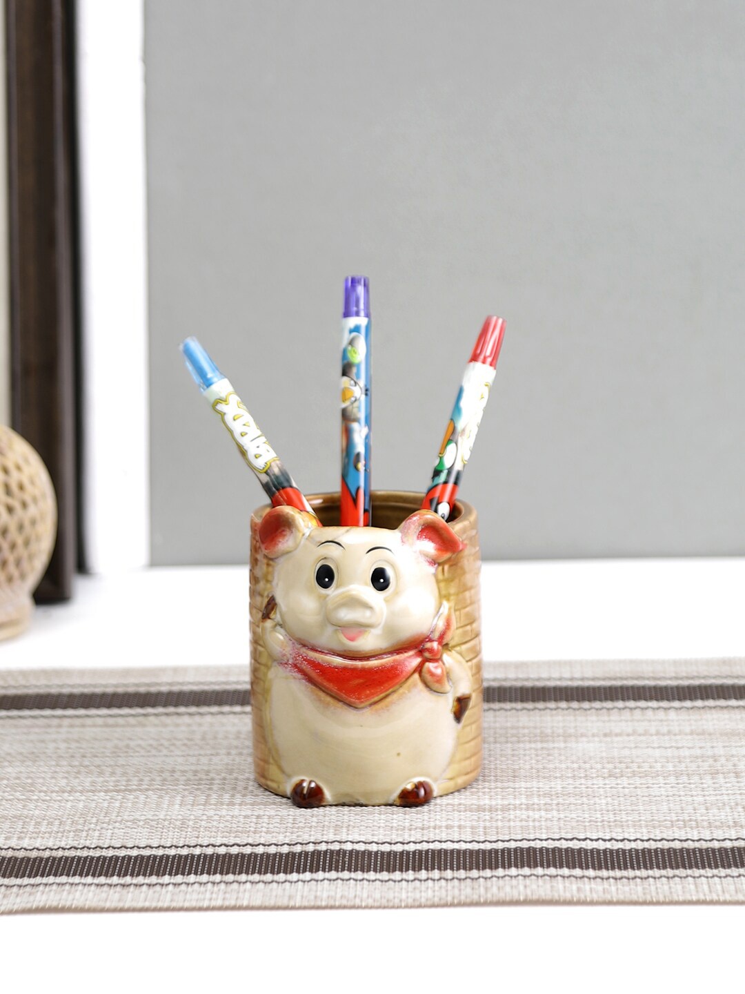 

Aapno Rajasthan Brown Piggy Design Ceramic Pen Stand