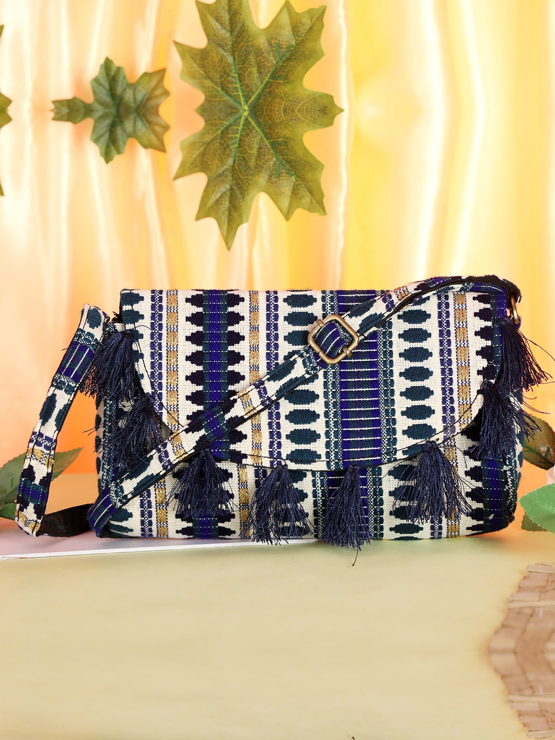 

gaura pakhi Women Pritned Structured Sling Bag With Tasselled, Blue