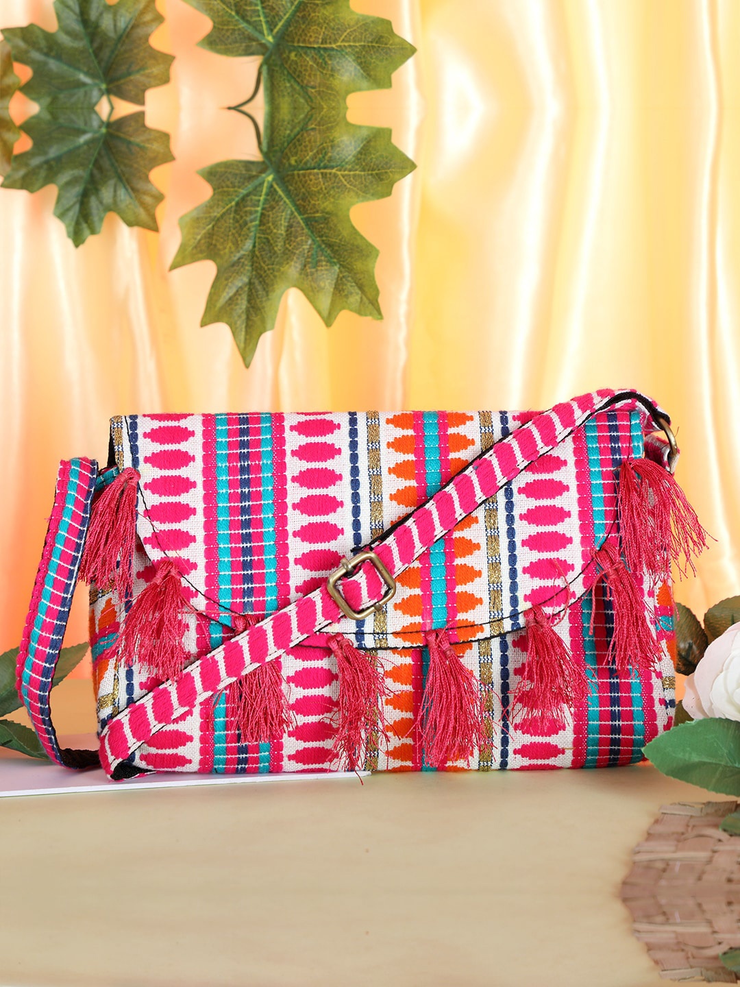 

gaura pakhi Women Printed Structured Sling Bag with Tasselled, Pink