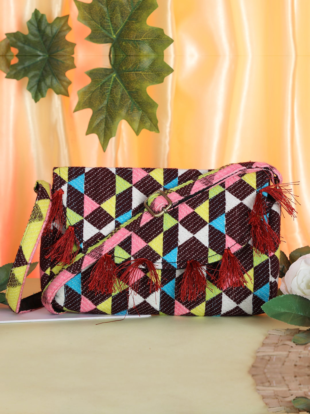 

gaura pakhi Women Floral Printed Structured Sling with Tasselled, Maroon