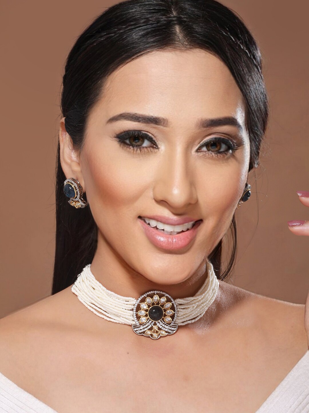 

Saraf RS Jewellery Gold-Plated Stone-Studded & Pearl Beaded Necklace & Earrings Set