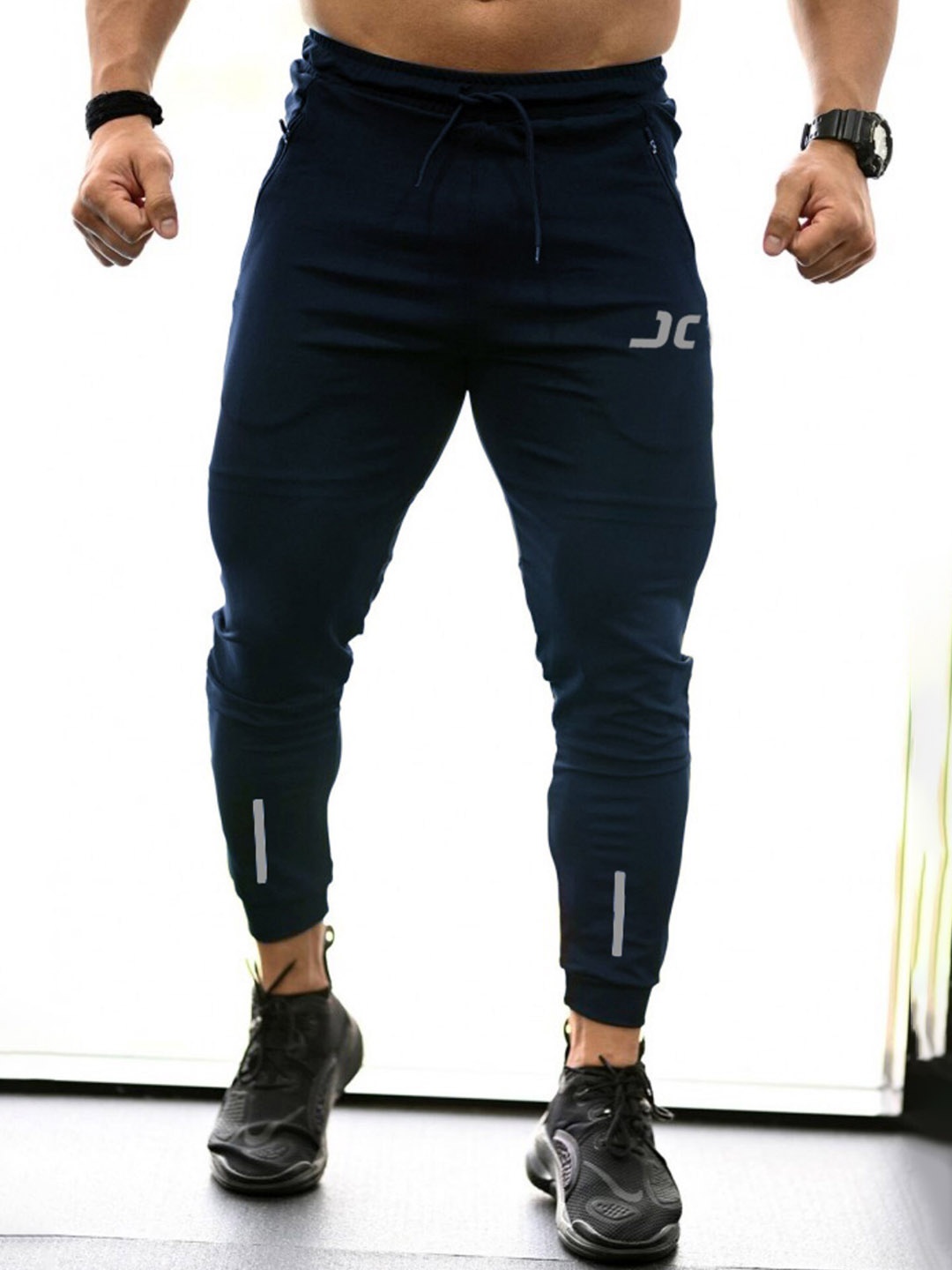 

JUMPCUTS Men Printed Slim-Fit Joggers, Navy blue