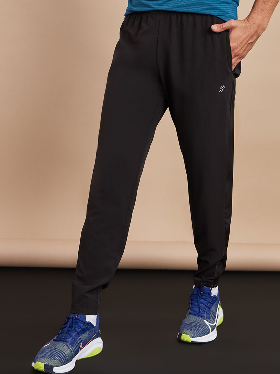 

Styli Men Woven Running Track Pants with Zip Hem, Black